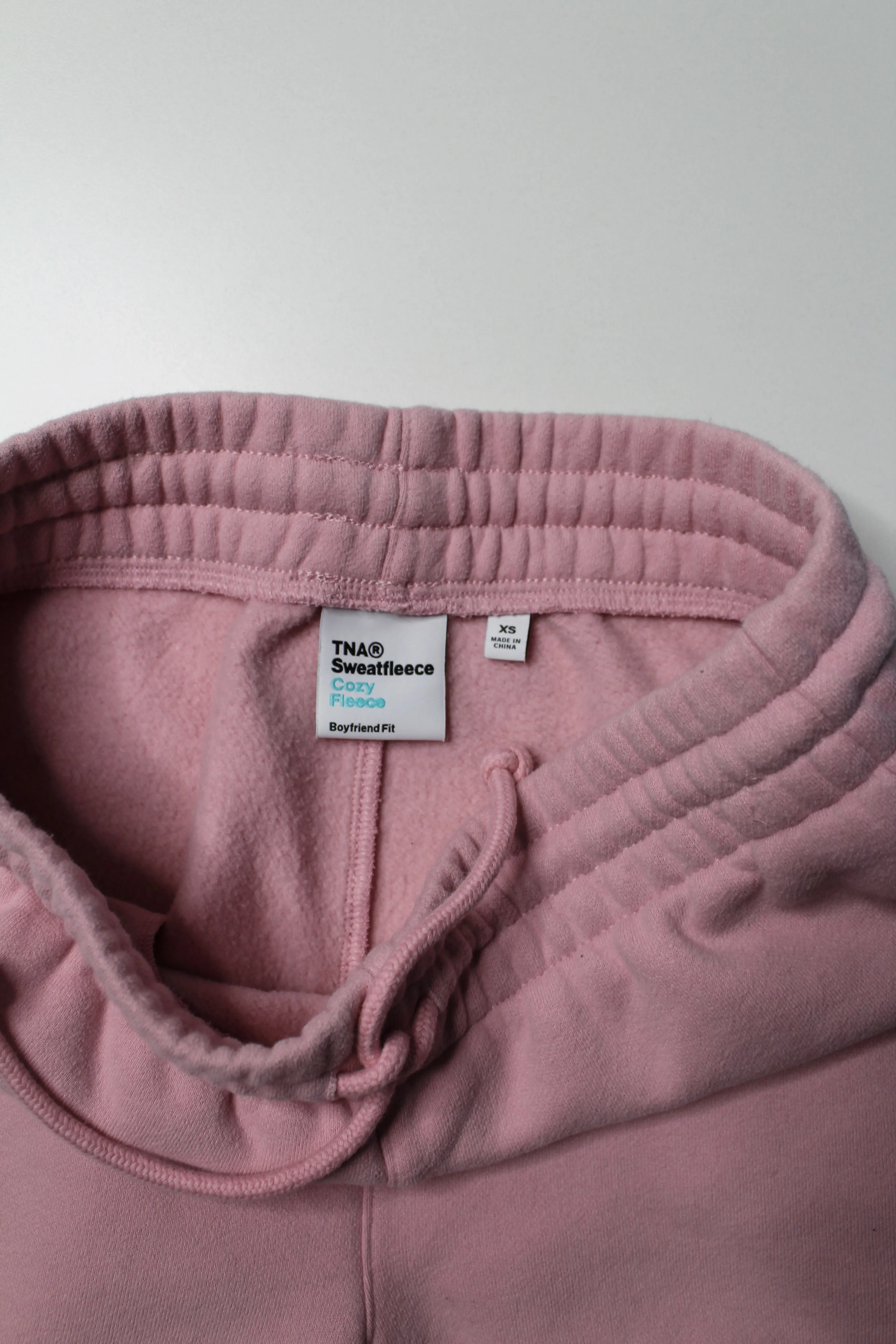 Aritzia TNA pink cozy sweat fleece shorts, size xs