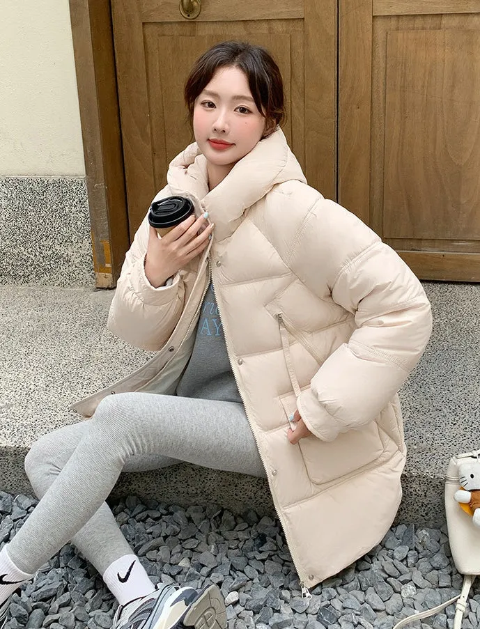 Quilted Thigh-Length Puffer Jacket for Women - Waterproof and Stain-Resistant