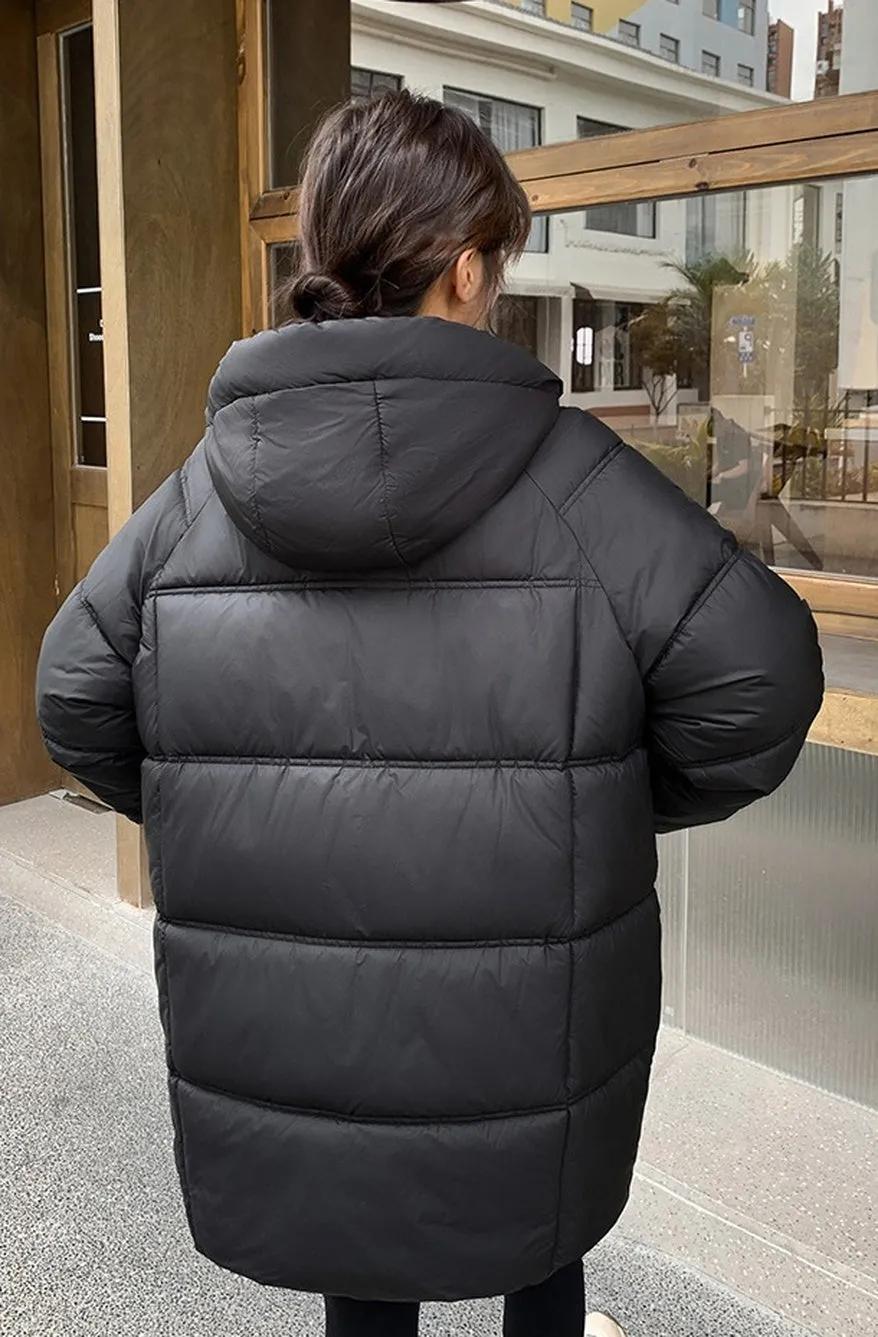 Quilted Thigh-Length Puffer Jacket for Women - Waterproof and Stain-Resistant