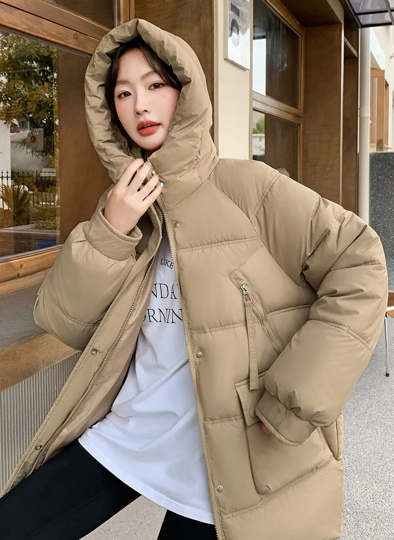 Quilted Thigh-Length Puffer Jacket for Women - Waterproof and Stain-Resistant