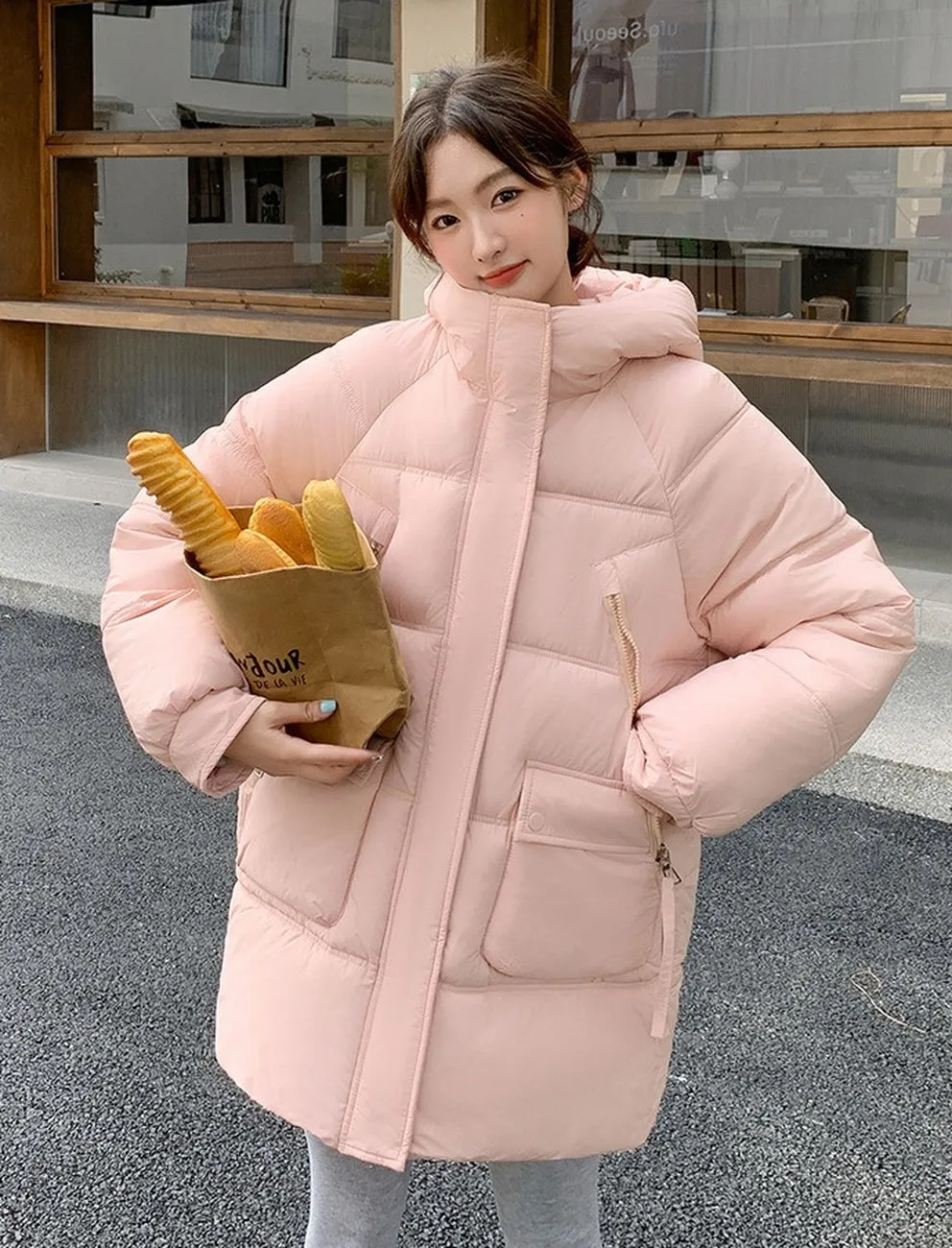Quilted Thigh-Length Puffer Jacket for Women - Waterproof and Stain-Resistant