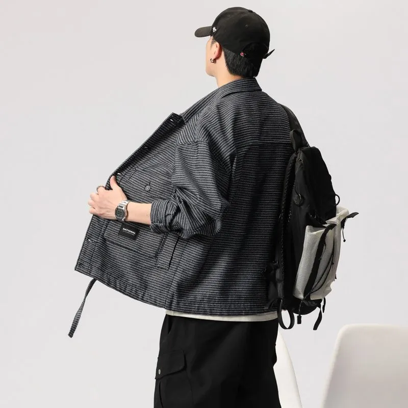 Stylish Men's Denim Trucker Jacket Featuring Large Pockets and Drawstring Hem