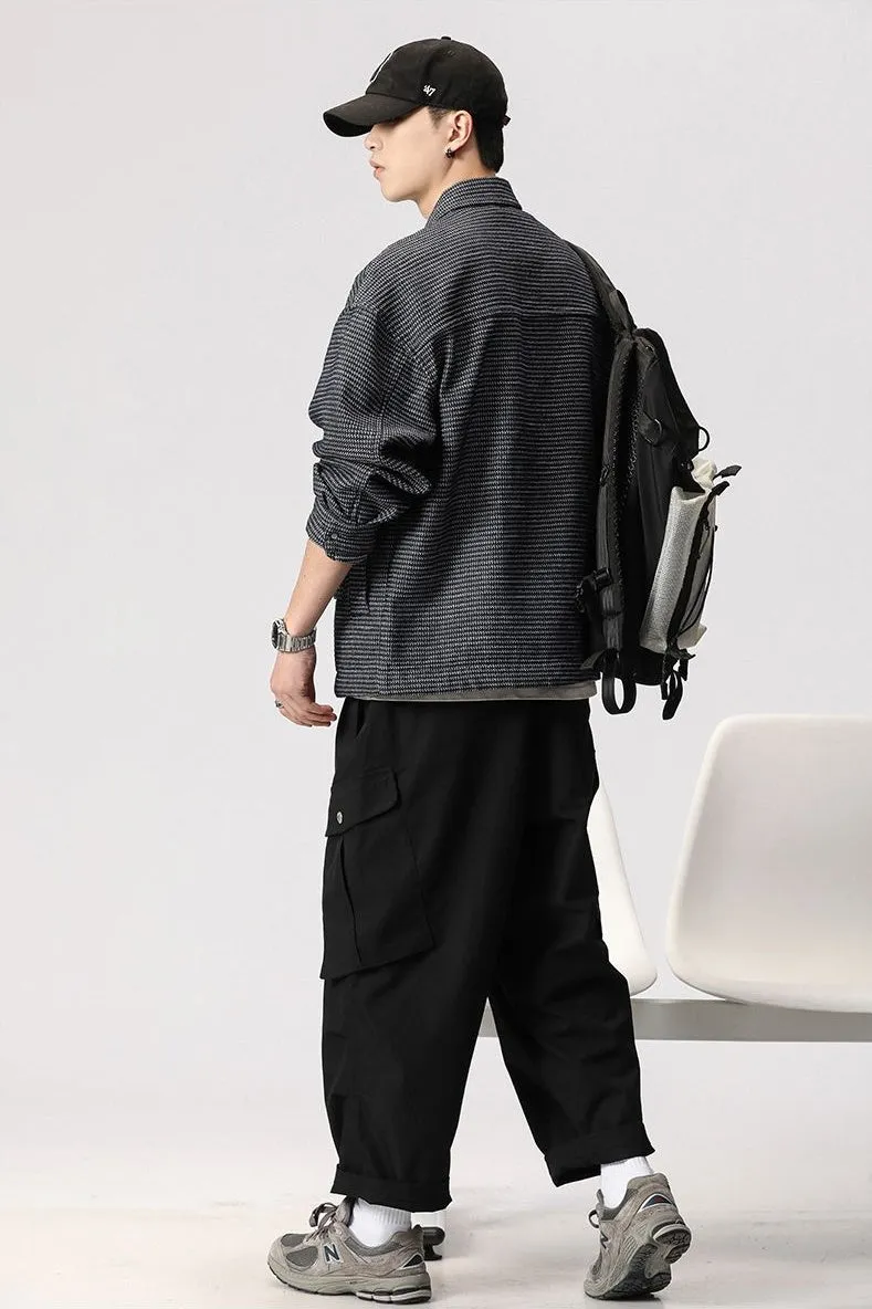 Stylish Men's Denim Trucker Jacket Featuring Large Pockets and Drawstring Hem