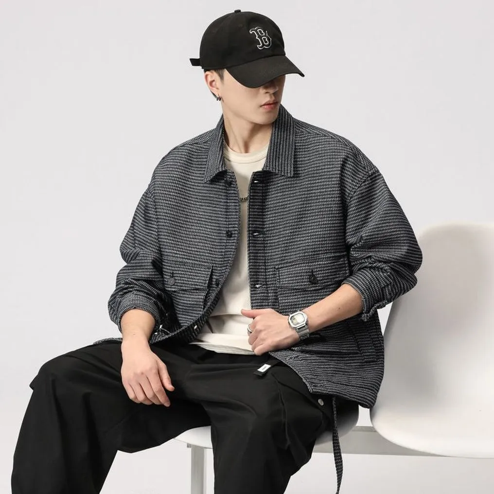 Stylish Men's Denim Trucker Jacket Featuring Large Pockets and Drawstring Hem